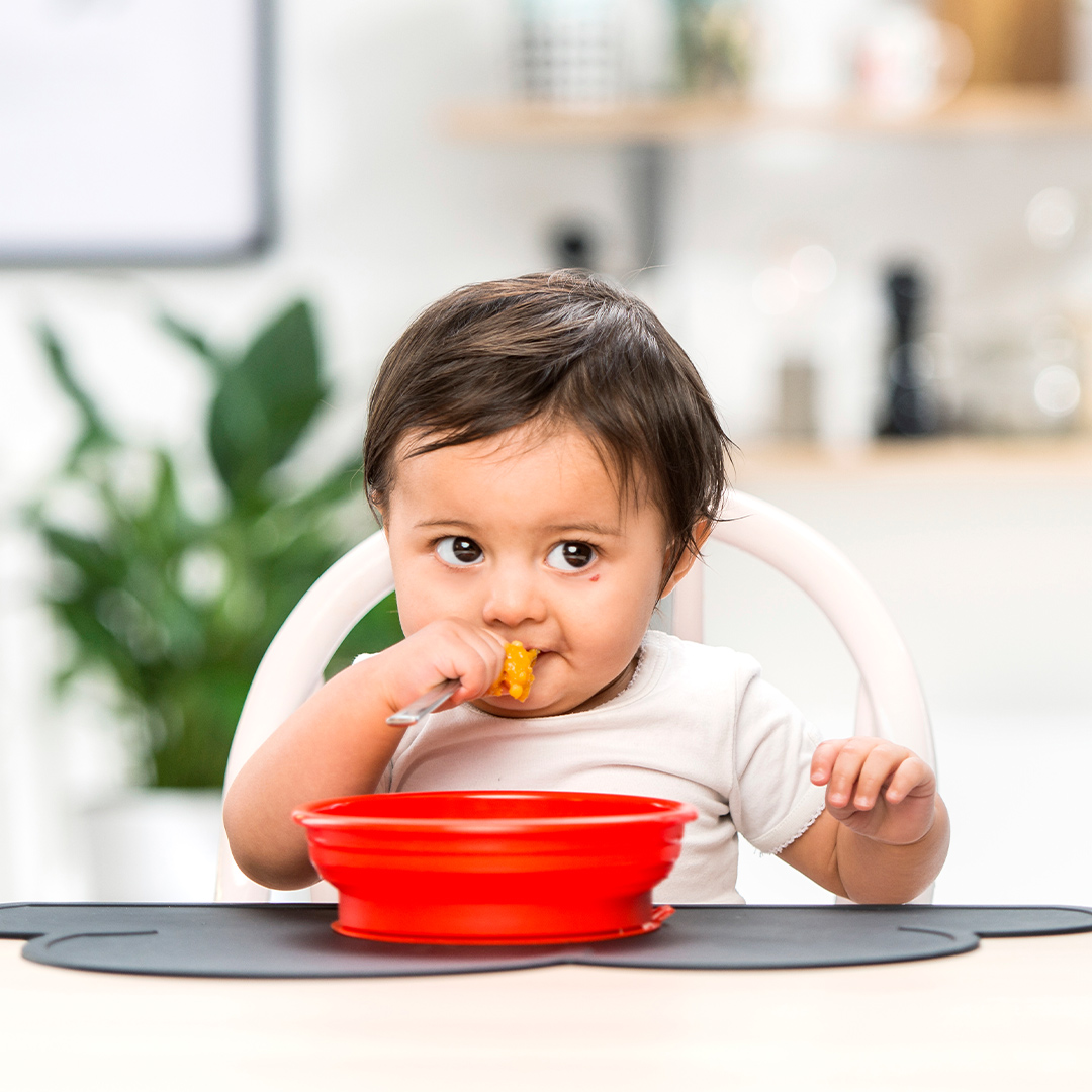 Banner baby eating